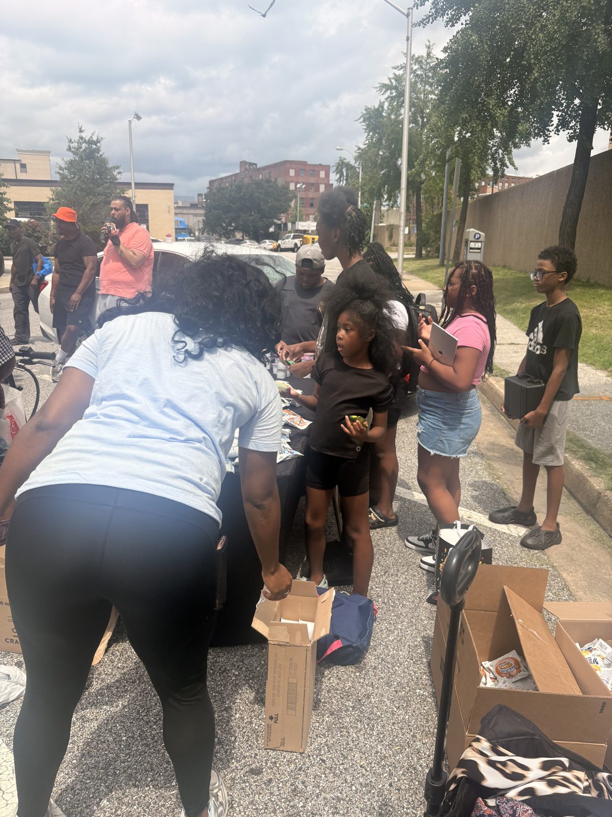 YQIT giving out supplies in the community