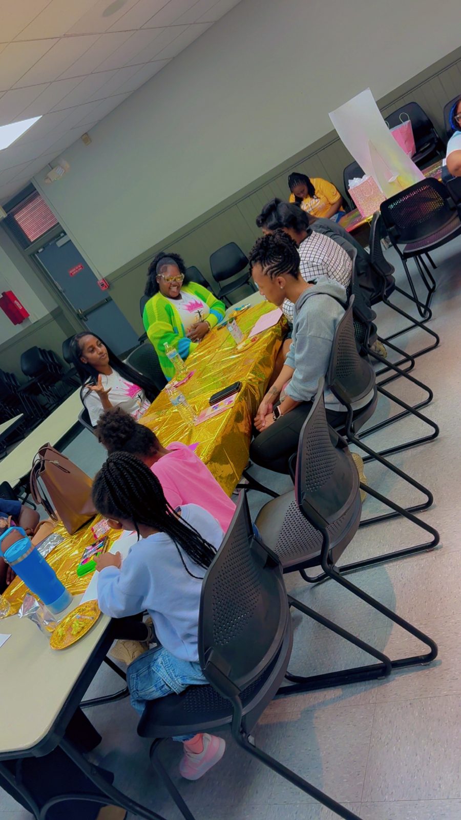 Girls and mentors at a YQIT workshop